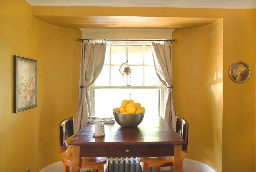 Dining room with yellow color palette